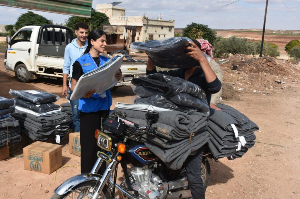 Distribution of winter kits to returning families in the governorates of Hama and Homs. © UNHCR/A. AlKady