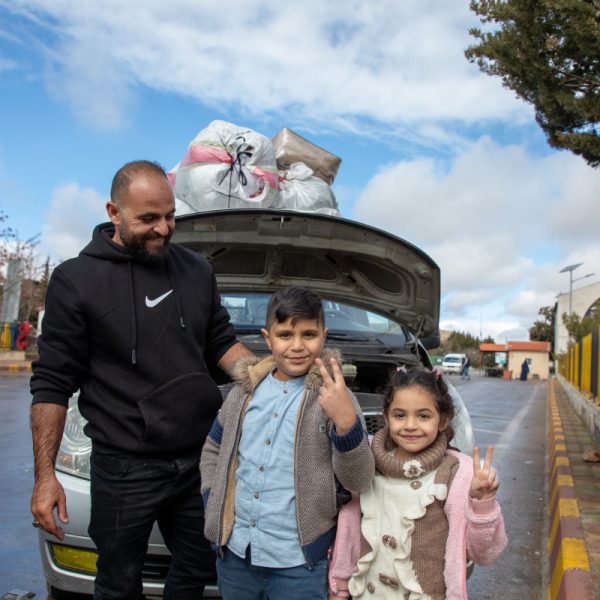 Returning Syrian refugee Mohamed and his family arrive in Syria, in January 2025.